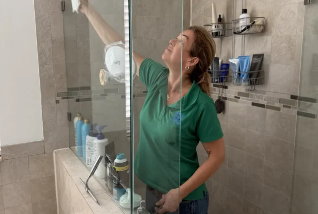 Deep cleaning of shower glass in a Boca Raton home