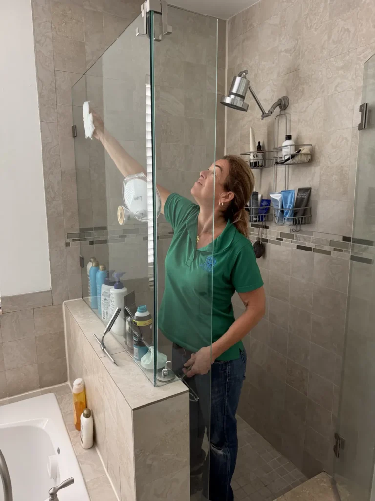 Deep cleaning of shower glass in a Boca Raton home
